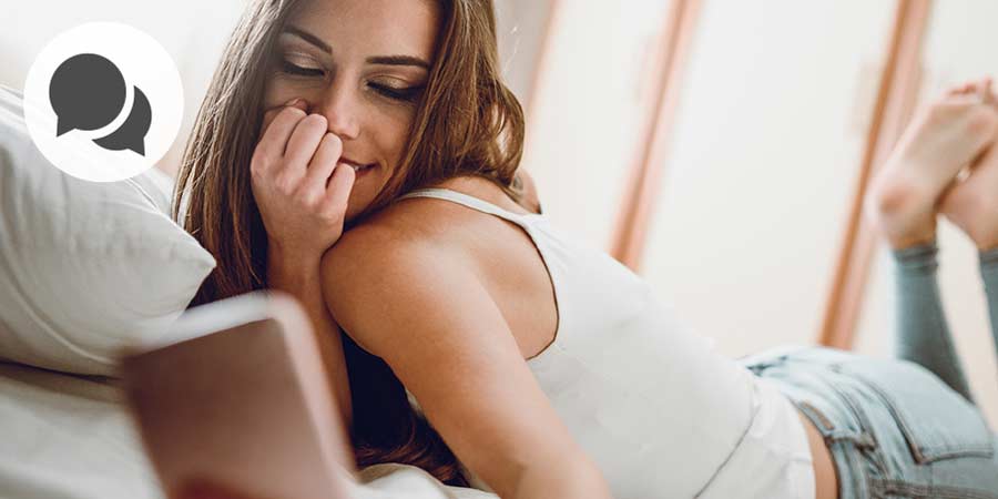 Young woman video chatting on her mobile device