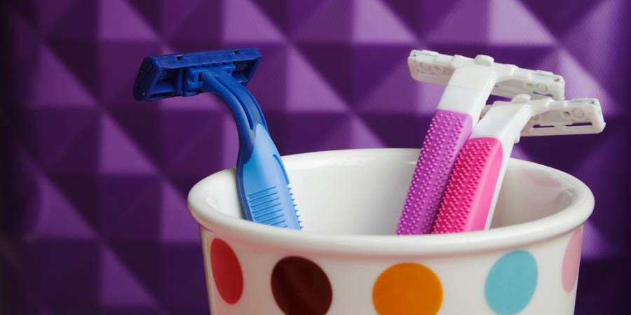 Colourful toothbrushes grouped together to represent a polyamorous household